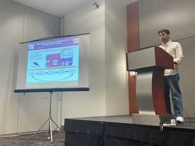 Shwet presenting DORA at OSCAR 2026 (co-located with ISCA 2026)